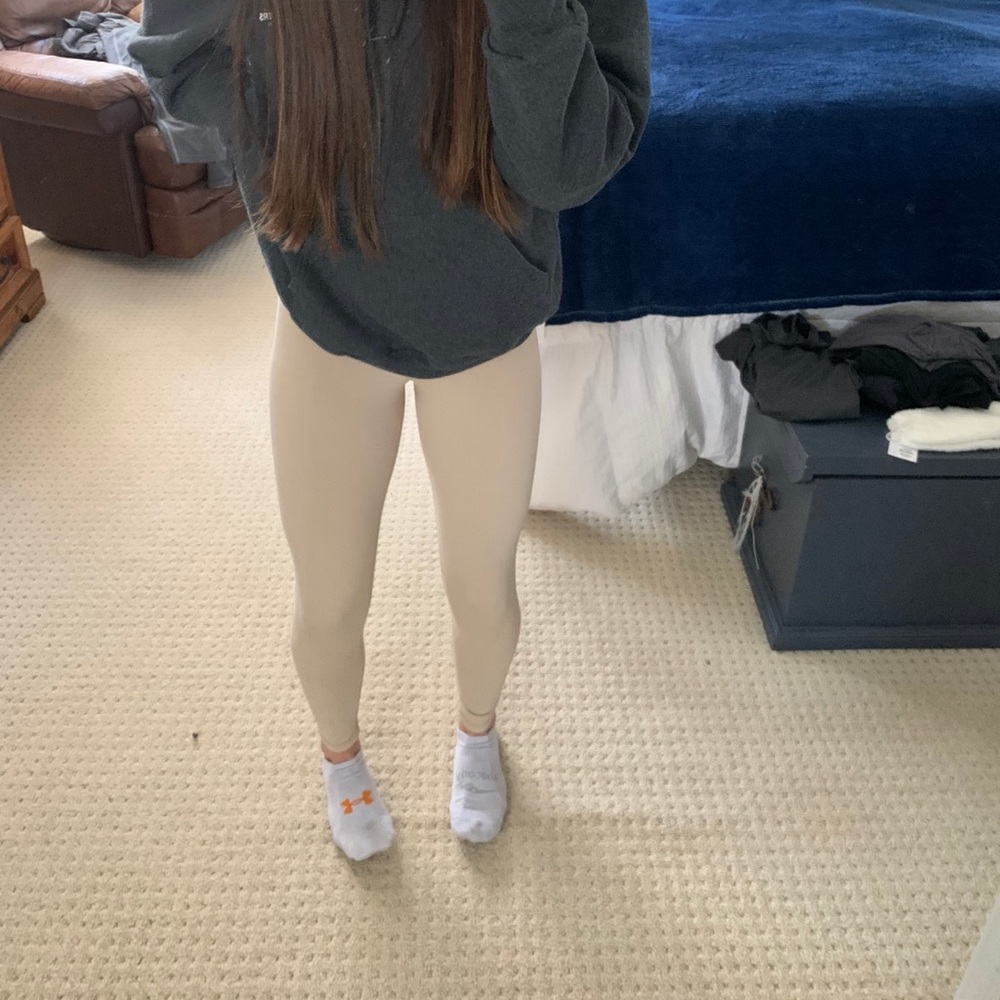 never worn and super cute tan leggings size XS